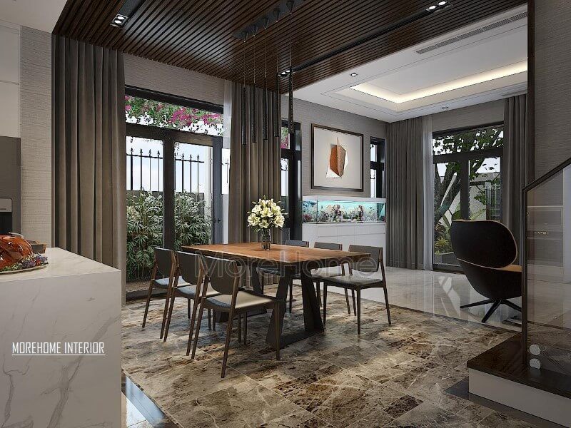 Bố trí phòng ăn hiện đại thông thoáng, chan hòa với thiên nhiên từ hệ cửa lớn giúp ánh sáng lan tỏa tối đa nhưng vẫn chắn nắng kịp thời từ rèm 2 lớp.